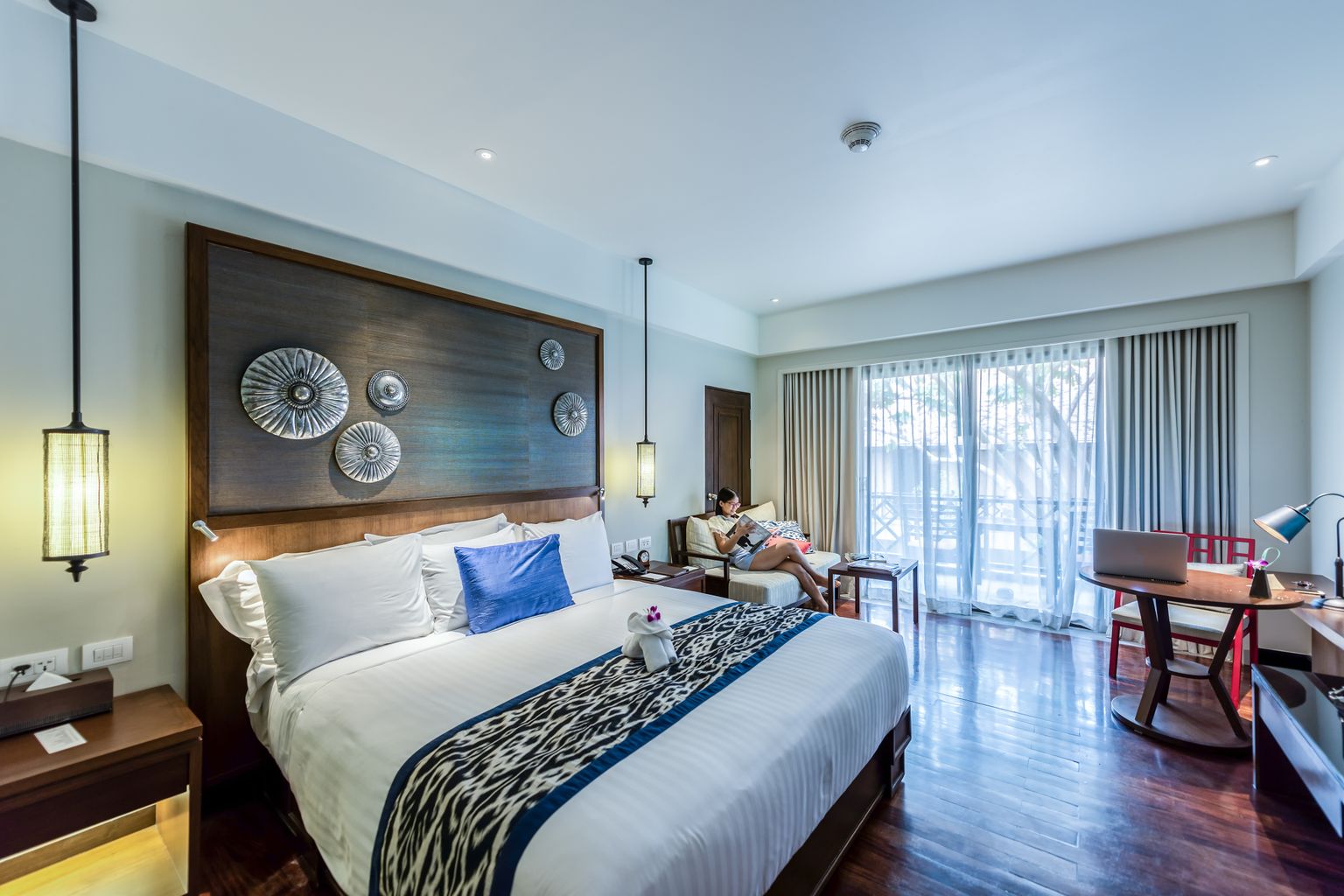 Bright hotel room booked through Booking.com