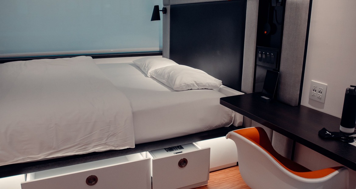 Cosy boutique hotel bedroom, typical of mid-range hotels in Manchester