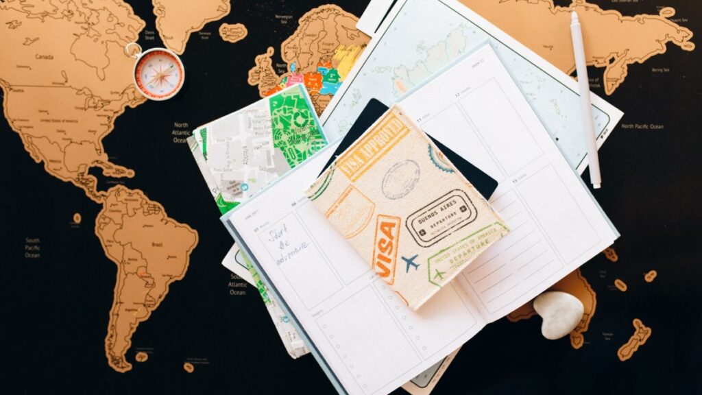 Travel planning items on a map for researching flight prices